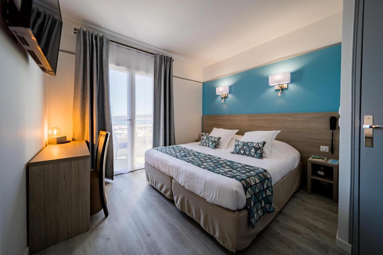 Le Rabelais Hotel Le Lavandou Bagian luar foto