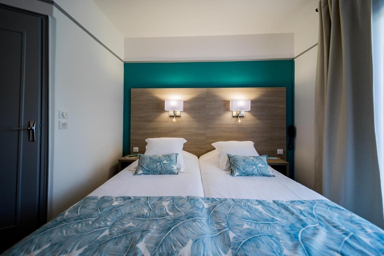 Le Rabelais Hotel Le Lavandou Bagian luar foto